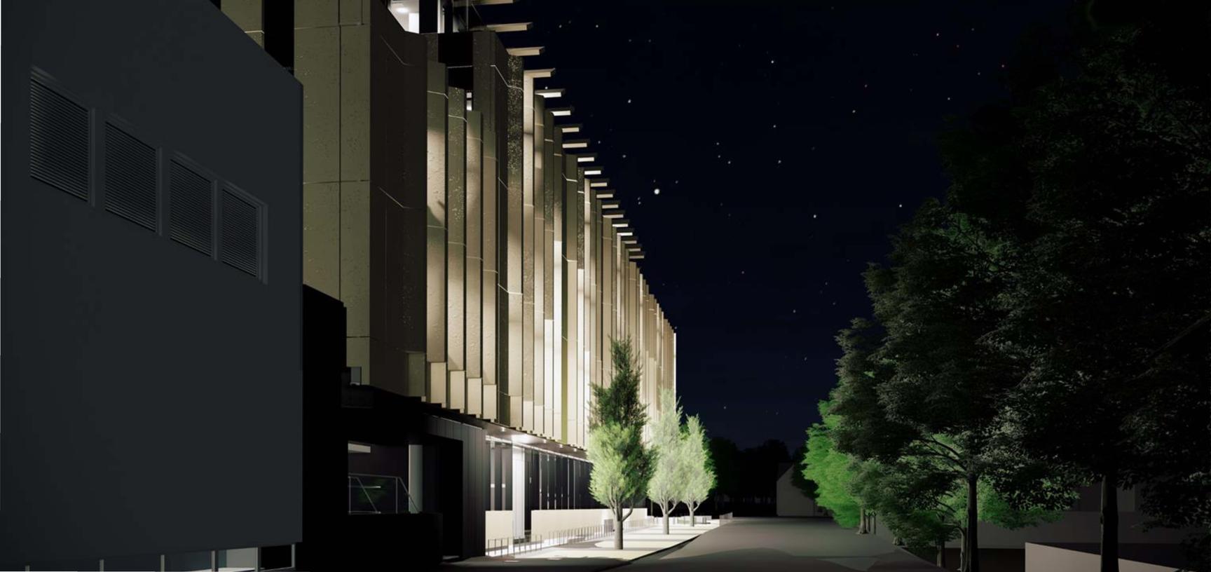 Architect's rendering of the Life and Mind Building east facing façade at night.