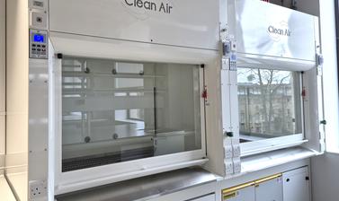 Close-up of two 'Clean Air' laboratory fume hood units in a laboratory