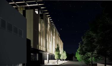 Architect's rendering of the Life and Mind Building east facing façade at night.