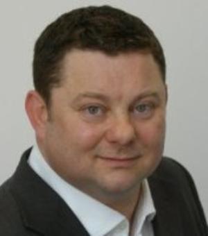 Portrait photograph of Chris Carrington.